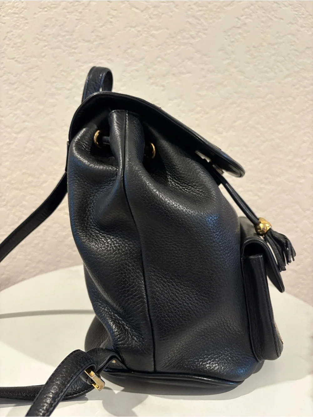 MCM Black Leather Drawstring Backpack with Gold Hardware